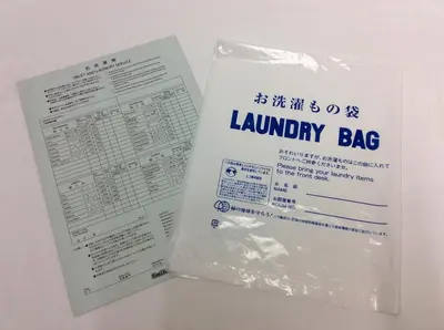 a package of laundry bag with a laundry bag at Smile Hotel Tokyo Nihonbashi in Tokyo