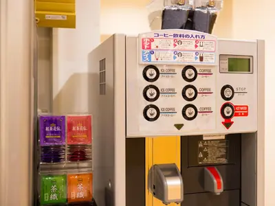 a ticket dispenser in a vending machine in a building at Super Hotel Tokyo Nihombashi Mitsukoshimae in Tokyo