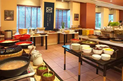 a kitchen filled with lots of different types of food at Chisun Hotel Hamamatsucho in Tokyo