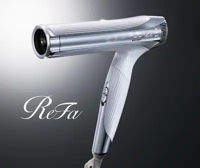 a close up of a white shower head at Hotel Monterey Ginza in Tokyo