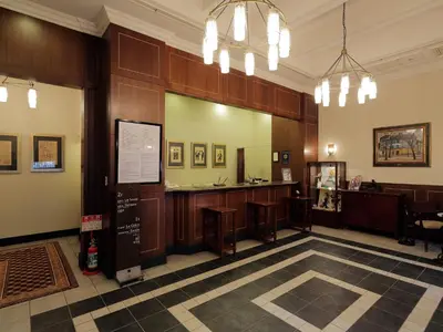 a lobby with a waiting area in a building at Hotel Monterey Ginza in Tokyo