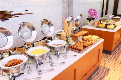 a buffet of food with bowls and plates of food at Hotel Tokyo Garden Palace in Tokyo