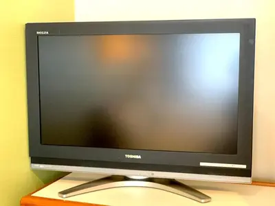 a flat screen tv sitting on a table at Tokyo Plaza Hotel in Tokyo