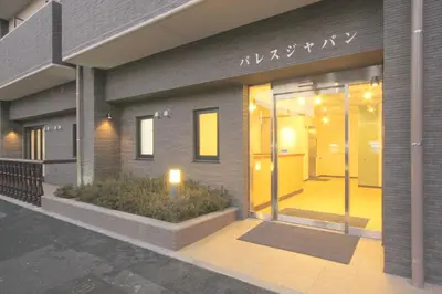 a facade of a building with a glass door at Hotel Palace Japan in Tokyo