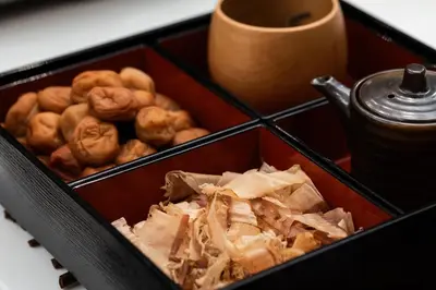 a box of pastries and a container of rolls at Hotel Keihan Asakusa in Tokyo