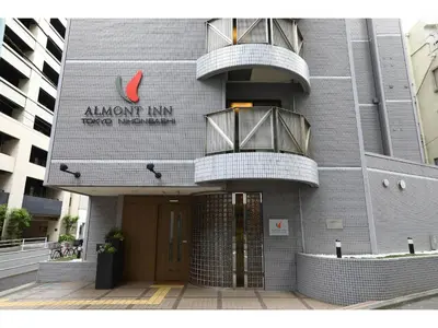 a building with balconies on the side of it at Almont Inn Tokyo Nihonbashi in Tokyo