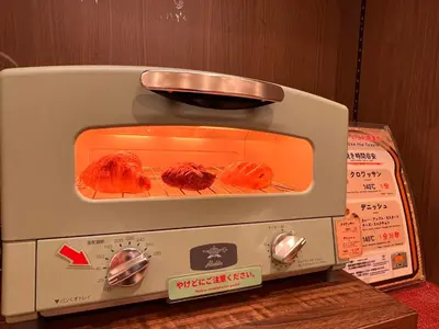 a toaster oven with some food inside of it at Almont Inn Tokyo Nihonbashi in Tokyo