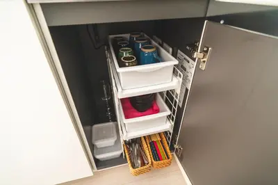 a door with drawers and pens and pencils at K&K Apartment Kita-Akabane #202 in Tokyo