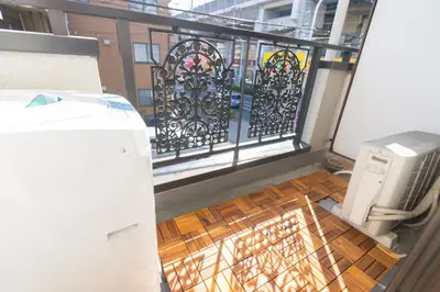 a view of a balcony with a gate at K&K Apartment Kita-Akabane #202 in Tokyo
