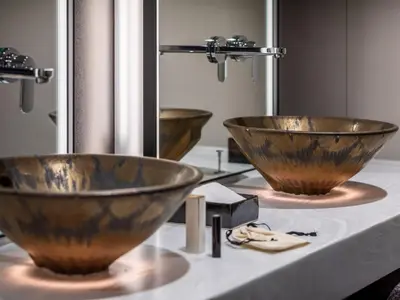 two wooden bowls on a counter in a bathroom at Mitsui Garden Hotel Nihonbashi Premier in Tokyo
