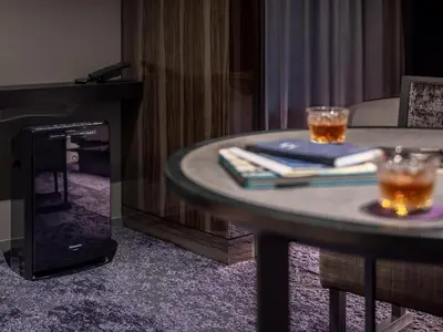 a table in a living room with two glasses on it at Mitsui Garden Hotel Nihonbashi Premier in Tokyo