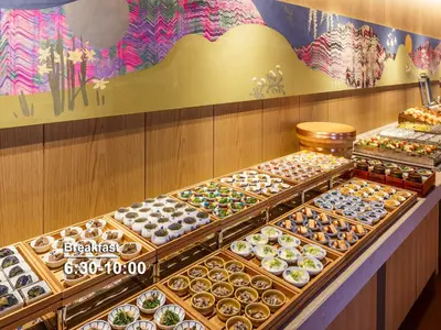 a display case filled with lots of different types of pastries at Mitsui Garden Hotel Nihonbashi Premier in Tokyo