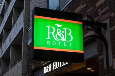 a sign for a hotel on the side of a building at Washington R&B Hotel Higashi Nihonbashi in Tokyo