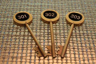 a group of four metal objects with numbers on them at Hotel Apio in Tokyo