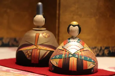 two nesting dolls sitting next to each other at Hotel Apio in Tokyo