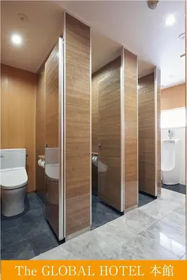 a hotel bathroom with a toilet at The Global Hotel Tokyo in Tokyo