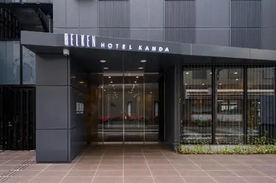 a building with the entrance to a hotel hotel karma at Belken Hotel Kanda in Tokyo