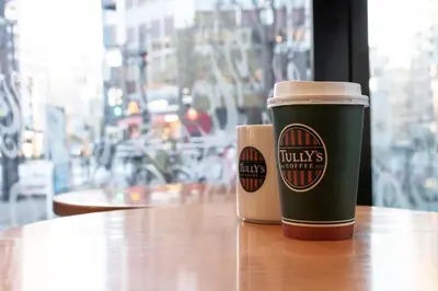 two cups of coffee sitting on a table at E Hotel Higashi Shinjuku in Tokyo