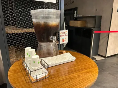 a drink in a blender sitting on top of a table at ICI HOTEL Ueno Shin Okachimachi in Tokyo