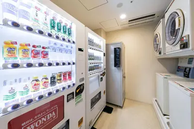 a convenience store with a soda machine at Ginza Capital Hotel Moegi in Tokyo