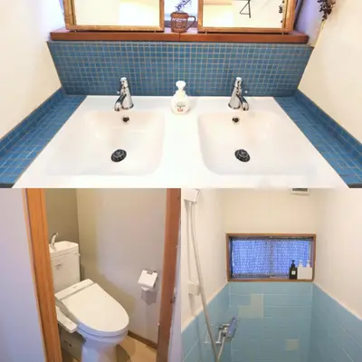 a bathroom with a sink and a toilet at Komatsuya in Tokyo