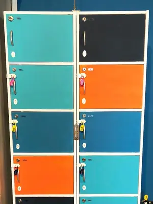a group of four different colored stacking boxes at GUEST HOUSE SaKURa in Tokyo