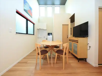 a kitchen and dining room with a table and chairs at COTO Tokyo Asakusa 5 in Tokyo