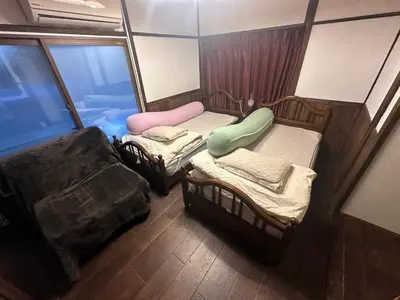 an overhead view of a room with two bunk beds at Kingyosou in Tokyo