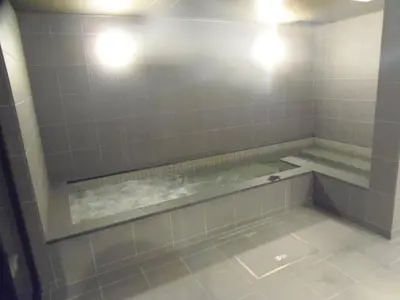 a bathroom with a bath tub with at The Nell Ueno Okachimachi in Tokyo