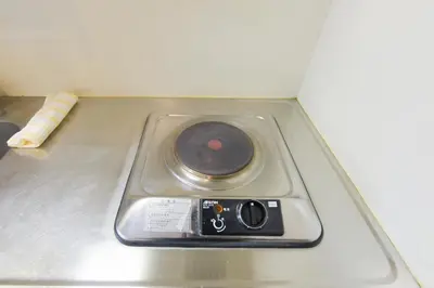 a remote control sitting on top of a table at HIROKI Building in Tokyo