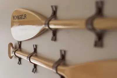 a pair of wooden sunglasses hanging on a wall at Tokyo Bay Maihama Hotel First Resort in Urayasu