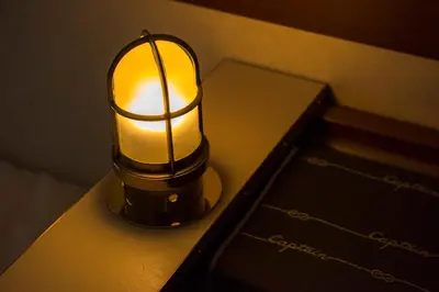 a lamp sitting on a table next to a box at Tokyo Bay Maihama Hotel First Resort in Urayasu