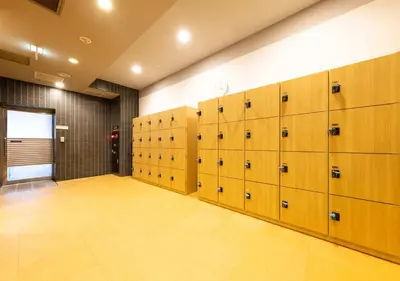 a row of lockers in a gymnasium at APA Hotel & Resort Tokyo Bay Shiomi in Tokyo