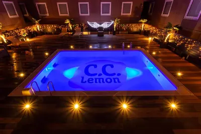 a pool in the middle of a room with lights at APA Hotel & Resort Tokyo Bay Shiomi in Tokyo