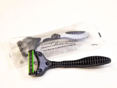 a pair of scissors on top of a package at APA Hotel Tokyo Ojima in Tokyo