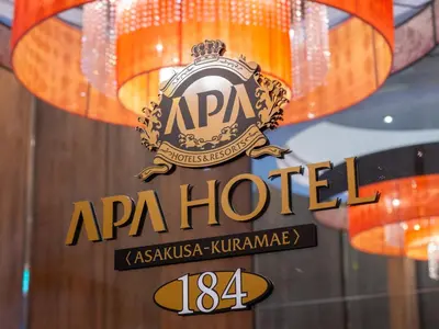 a sign in a window of a apa hotel at APA Hotel Asakusa Kuramae in Tokyo