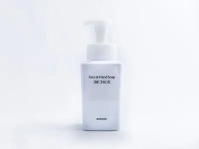 a white bottle of moisturizing soap on a white background at APA Hotel Ikebukuro Eki Kitaguchi in Tokyo