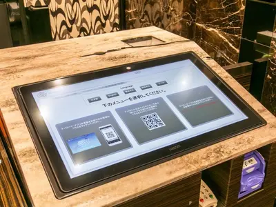 a tablet computer sitting on top of a counter at APA Hotel Tokyo Itabashi Ekimae in Tokyo
