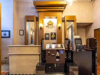 a restaurant with a cash counter and a cash register at APA Hotel Nishiazabu in Tokyo