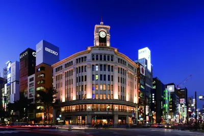 a building with a clock tower on top of it at Solaria Nishitetsu Hotel Ginza in Tokyo