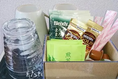 a box filled with food and a bottle of water at Namio Apartment 201 in Tokyo