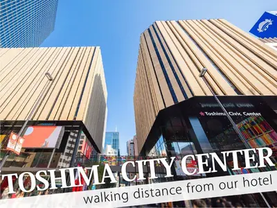 a building with the sign for a walking distance from our hotel at Hotel Amethyst in Tokyo