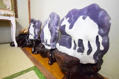 a group of sculptures sitting on top of a table at Oasis Minamiyukigaya in Tokyo