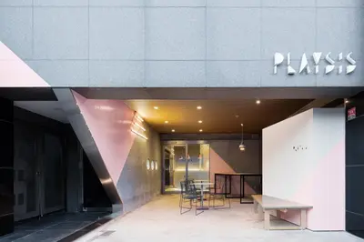a view of the entrance to a paxos building at Playsis East Tokyo in Tokyo