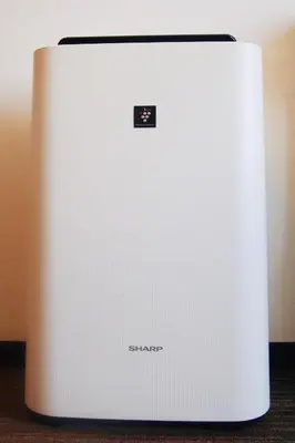 a white refrigerator sitting on top of a table at Sotetsu Fresa Inn Hamamatsucho-Daimon in Tokyo
