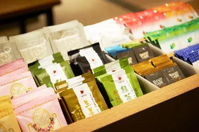 a bunch of different types of wrapping paper on a table at Sotetsu Fresa Inn Hamamatsucho-Daimon in Tokyo