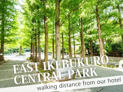 a park with a sign that reads east walking at Ikebukuro Central Hotel in Tokyo