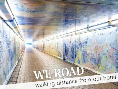 a hallway in a building with the words we road walking distance from our hotel at Ikebukuro Central Hotel in Tokyo
