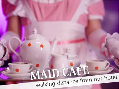 a woman holding a table with tea pots and cups at Ikebukuro Grand Hotel in Tokyo