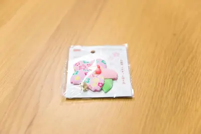 a small cookie in a bag on a table at Tokyo Aoto House in Tokyo